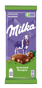 Шоколад MILKA молочный цельный фундук 80г